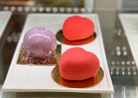 A tempting array of heartshaped desserts presented in vibrant, eyecatching Stock Photos