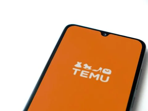 Temu app launch screen on smartphone on white background Stock Photos