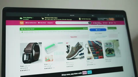 TEMU website homepage on a computer screen, highlighting online shopping Stock Footage 333538212