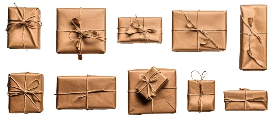 Ten brown parcels wrapped with string on transparent background Stock Photos