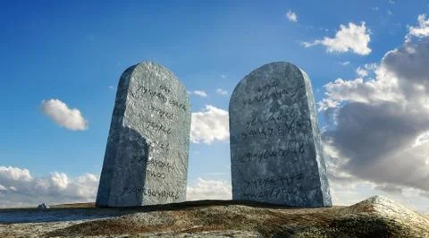 Ten commandments stones, viewed from ground level in dramatic perspective, wi Illustrazione stock