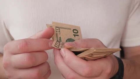 Ten dollar stack of bills Stock Footage 287579038