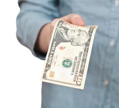 Ten dollars banknote in hand Stock Photos