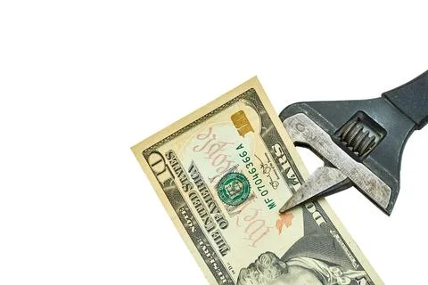 Ten dollars bill in iron adjustable wrenches 스톡 사진