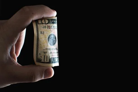 Ten dollars in hand Foto stock
