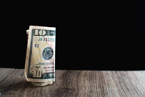 Ten dollars on the table Stock Photos