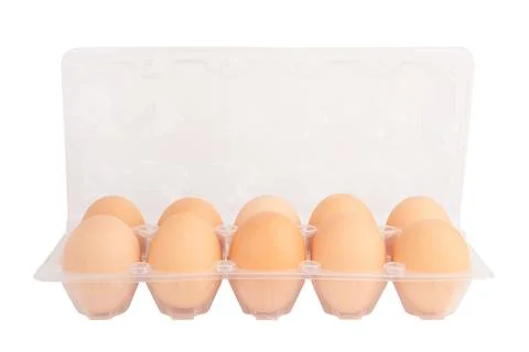 Ten eggs in a plastic tray isolated Stock Photos