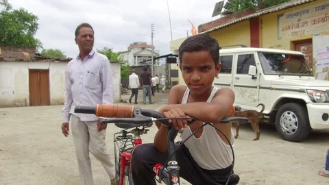 Ten year old boy playing bicycle Stock Footage 77649142