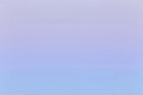Tender colorful gradient of the sky at the cloudless sunrise Stock Photos
