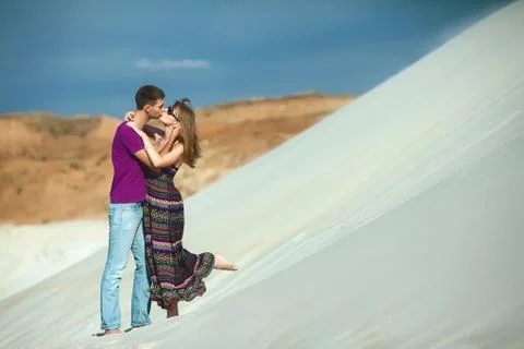 Tender lovers on beach Stock Photos