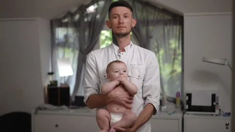 Tender Moments The Special Connection Between a Father and His Baby, A Beautiful Stock Footage 317405036