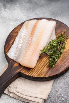 Tender Pacific cod loin, raw fish fillet featuring a light hue and flaky te.. Stock Photos