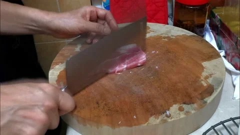 Tenderize meat by beating the meat with big knife for steak Stock Footage