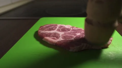 Tenderize pork meat closeup Stock Footage 136410089