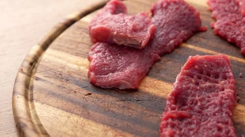 Tenderizing Beef Steaks on Board. Stock Footage 255251256