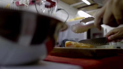 Tenderizing Chicken with Meat Mallet on Cutting Board in Kitchen Stock Footage 334622638