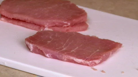 Tenderizing Pork 스톡 동영상 329460