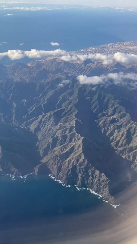 Tenerife aerial view over sharp peaks of Anaga Rural Park and the plane wing Stock Footage 310639558