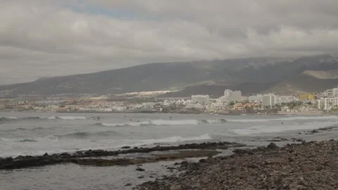 Tenerife, beach view with cloudy mountains and city Stock Footage 328253785