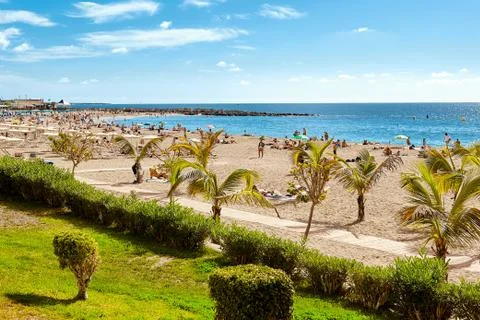 Tenerife. Tropical beach. Seaside resort at summer day. Tourism and travel. Stock Photos