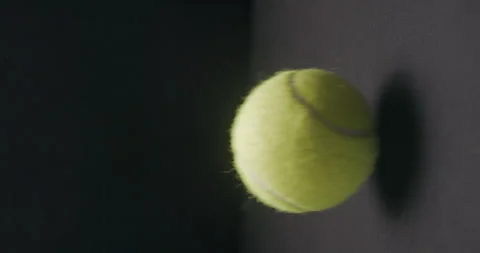 Tennis ball bouncing slow motion studio, vertical Stock Footage 242930724