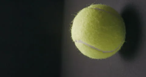 Tennis ball bouncing slow motion studio, vertical Stock Footage 242930832