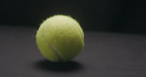 Tennis ball bouncing studio slow motion Stock-Footage 242930823