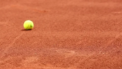 The tennis ball rolls Stock Footage 75216964