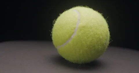 Tennis ball rotating studio Stock Footage 242929601