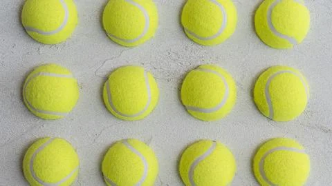 Tennis Balls Arranged in Pattern Close View Stock Photos