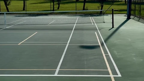 Tennis court wide net green turf Perth Australia Stock Footage 314250676