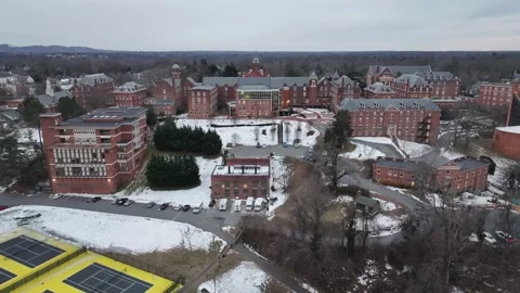 Tennis fields and red brick private Randolph College School in Lynchburg Town Stock Footage 303399375