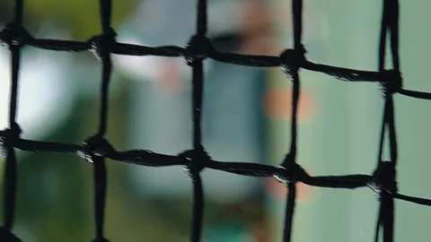 Tennis net closeup floating on wind. Sport Cord patterns macro close up Vertical Stock Footage 249476127
