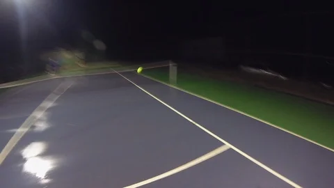 Tennis Player Holding Racket And Hitting Ball In Slow Motion POV Stock Footage 128931653
