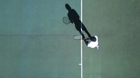Tennis Player Practicing Overhead Shot on Hardcourt Video stock 317957964