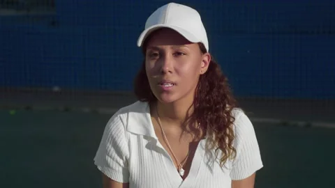 A tennis player is preparing to hit the ball with a racket Stock Footage 221758079