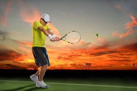 Tennis player at sunset Stock Photos