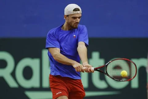 Tennis player Tomas Machac of Czech team in action during the match agains... Stock Photos