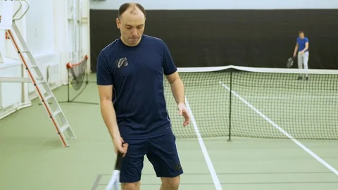 Tennis player warms up before game Stock Footage 125331341