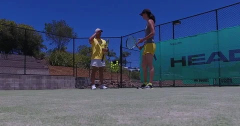 Tennis serve coaching lesson Stock Footage 70132327