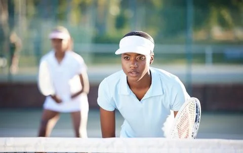 Tennis, sport and serious black woman on outdoor court, train and fitness Stock Photos