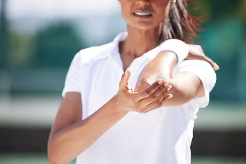 Tennis, sports woman and elbow injury with pain, first aid emergency and medical Stock Photos