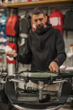 Tennis stringer doing racket stringing Stock Photos