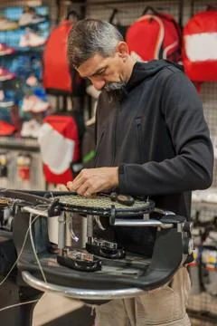 Tennis stringer doing racket stringing Stock Photos