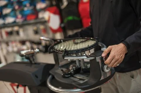 Tennis stringer doing racket stringing Stock Photos