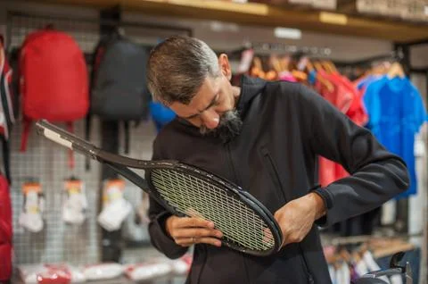 Tennis stringer doing racket stringing Stock Photos