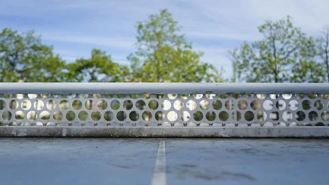Tennis table with a city background 写真素材