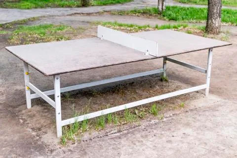 Tennis table in the yard Stock Photos