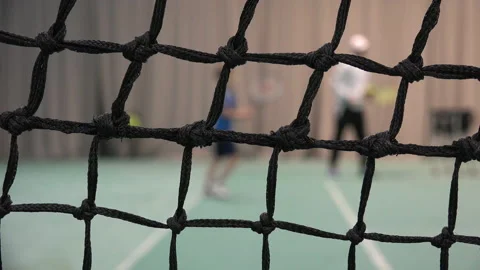 Tennis Training with net in the foreground Stock Footage 239772814