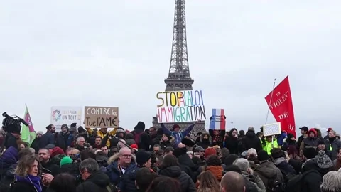Tens of thousands protest in Paris against immigration law, París (es-ES), FR -  Stock Footage 262280667